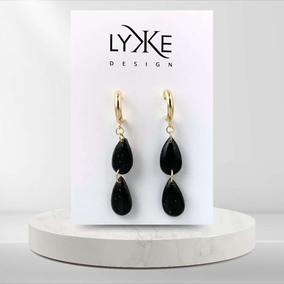 Gullfargede øreringer med to dråper Sort galakse/gull