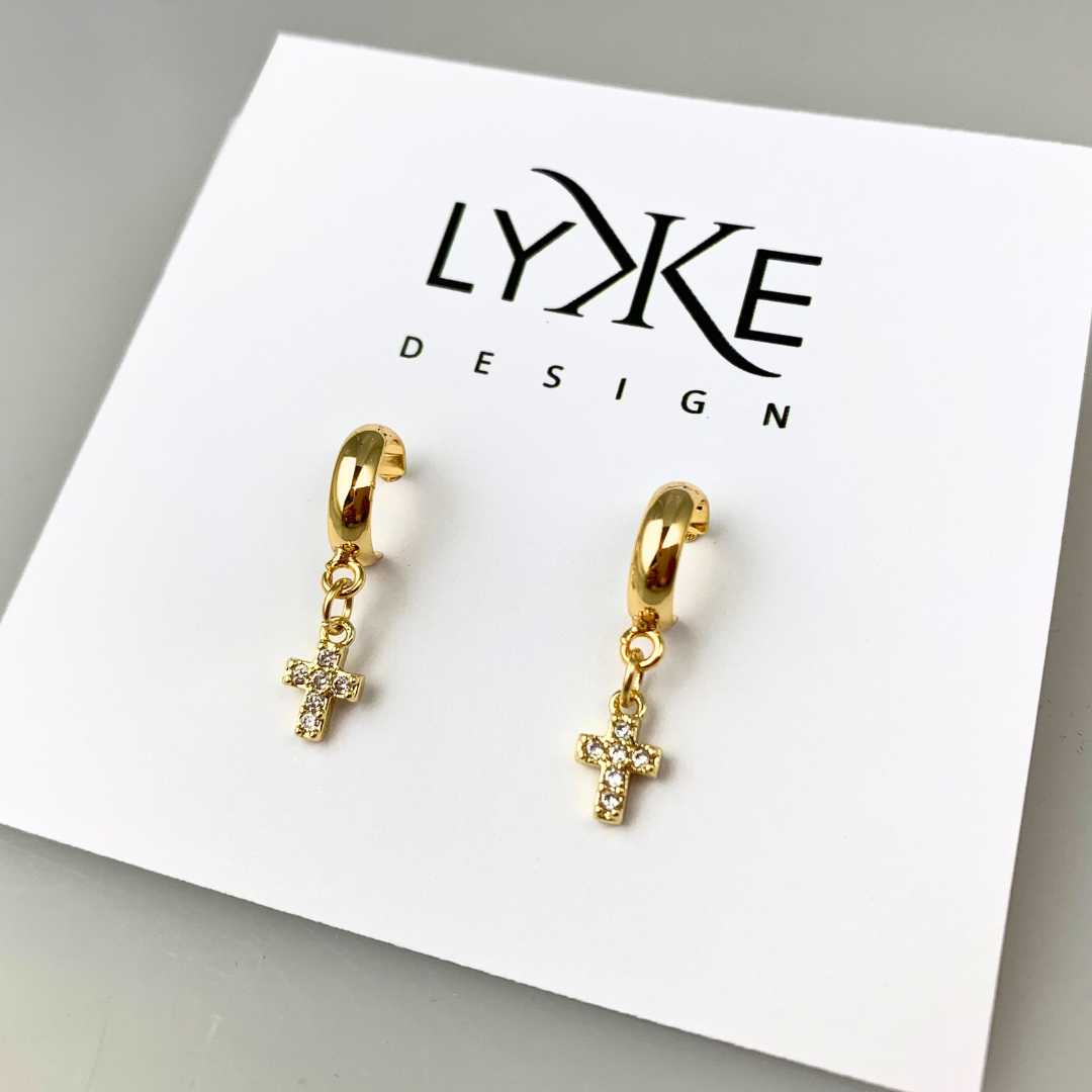 Gullfargede øreringer med kors