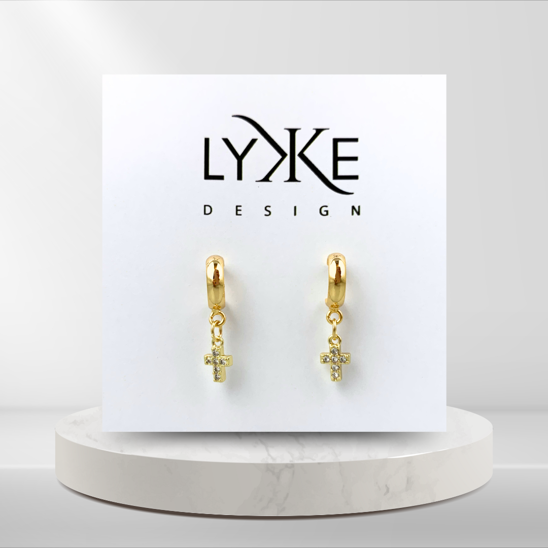 Gullfargede øreringer med kors