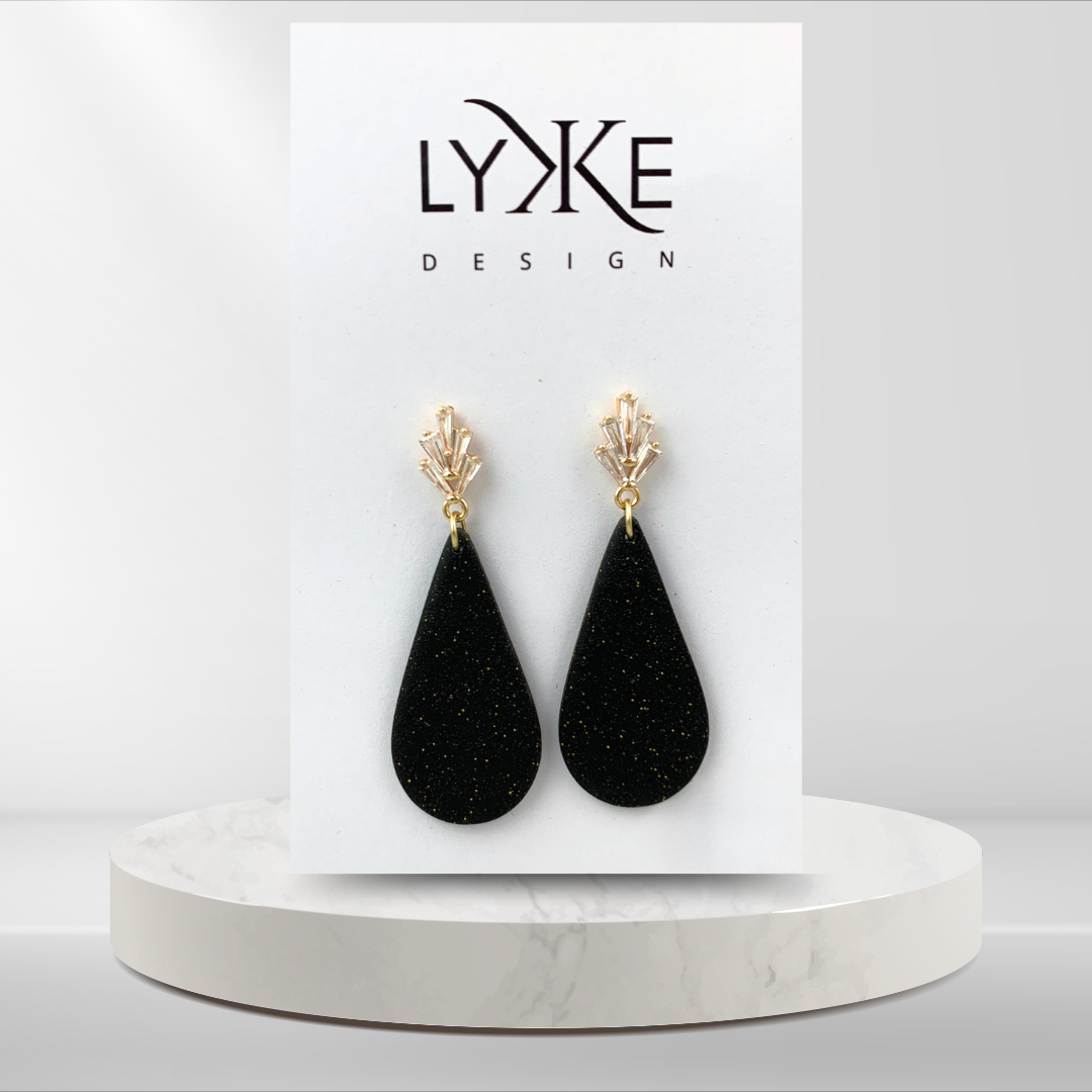 Gullfargede øredobber med stor dråpe og Zirkonia stener