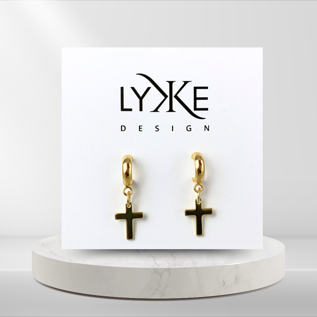 Gullfargede øreringer med gullkors